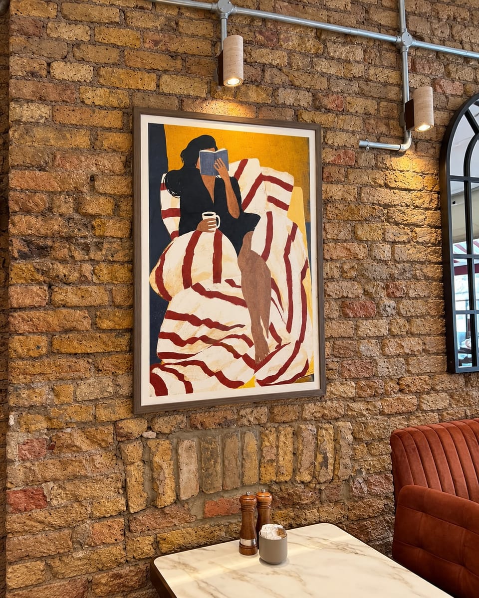 Artwork on the exposed brick wall inside Hanımeli
