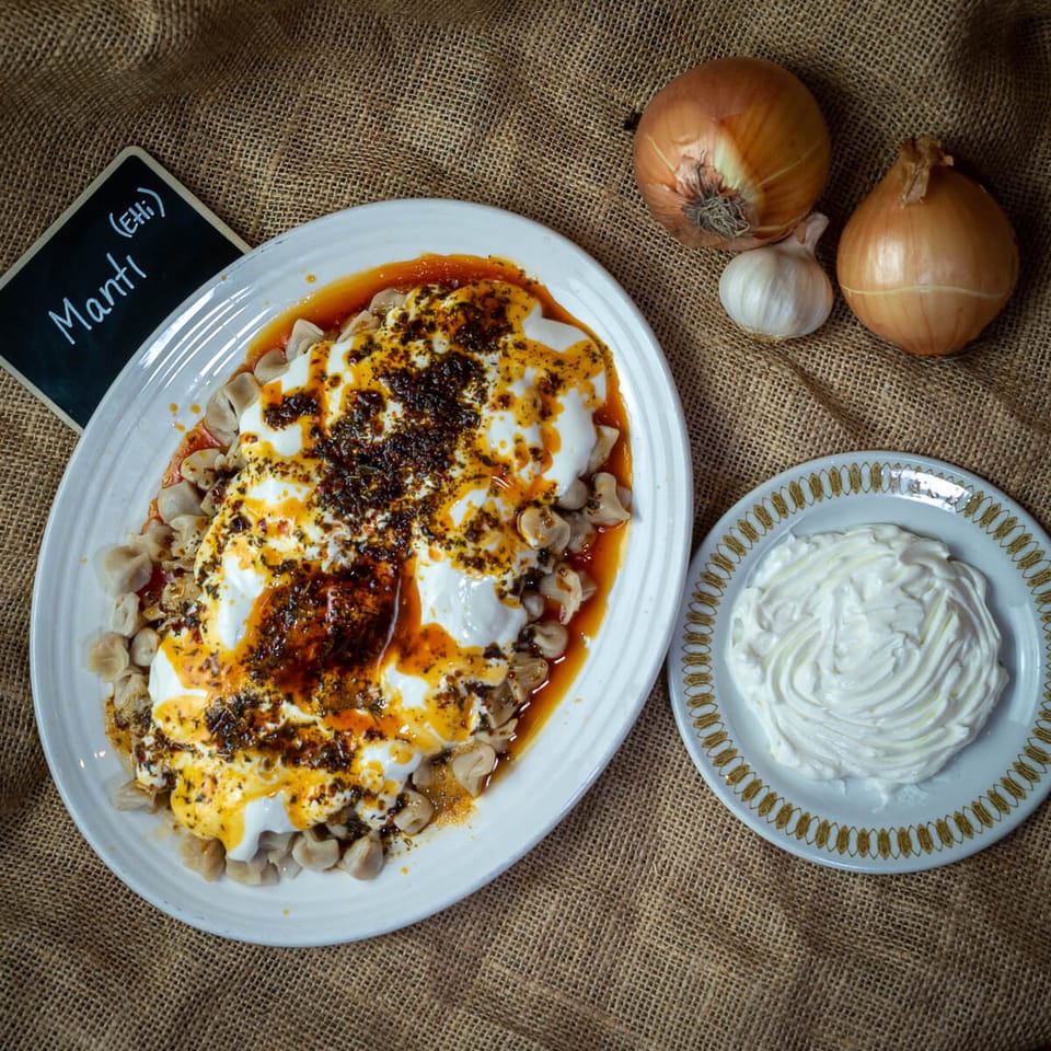 Mantı — Hand-pinched dumplings, yoghurt, paprika butter